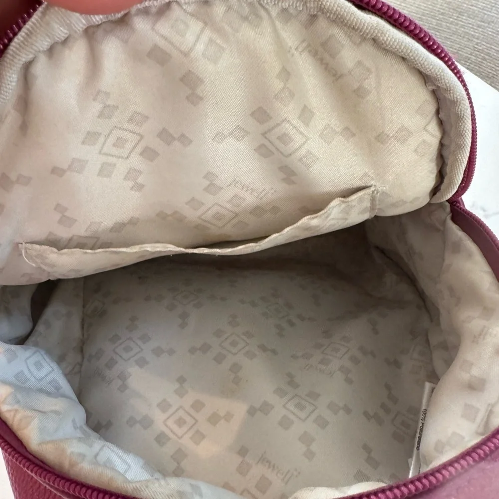 Jewell small backpack purse.  Purple in color. Good used condition.